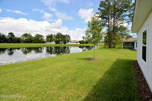 a view of a lake with a garden
