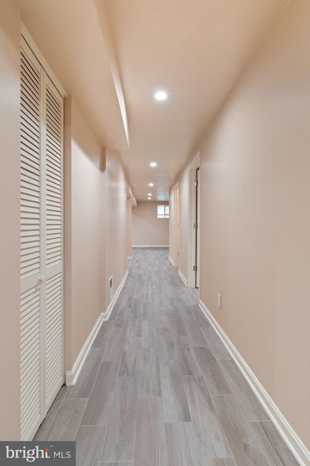 7619 Hayfield Road Alexandria, VA 22315 - Photo 41 of 60 Lower level hallway