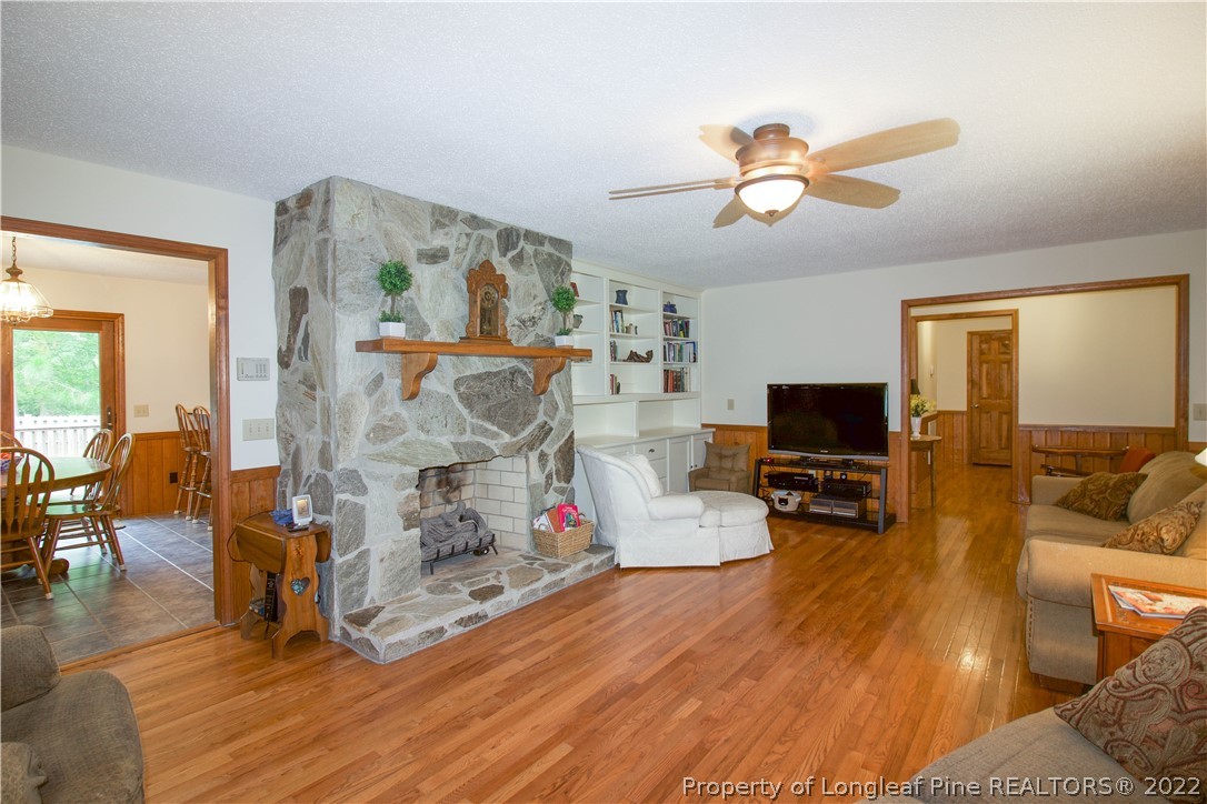 144 Manor Road Carthage, NC 28327 - Photo 11 of 47 a living room with furniture and a flat screen tv