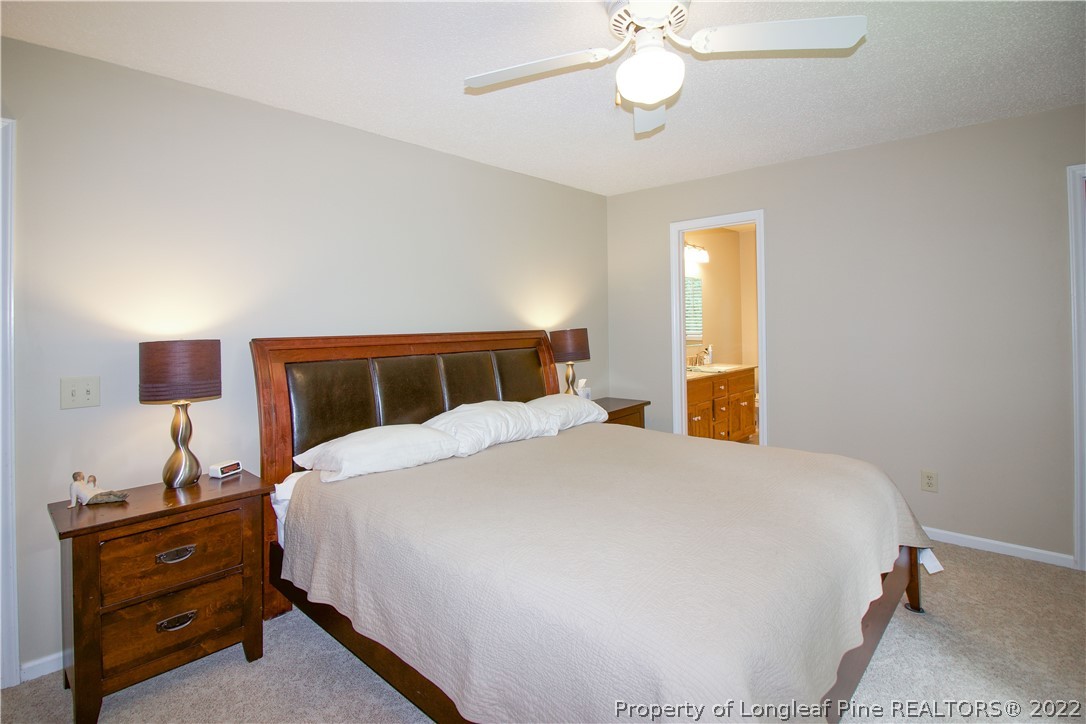 144 Manor Road Carthage, NC 28327 - Photo 26 of 47 a bedroom with a bed and window