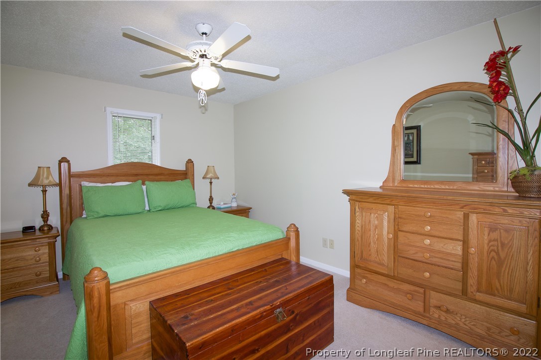 144 Manor Road Carthage, NC 28327 - Photo 28 of 47 a room with a bed and dresser