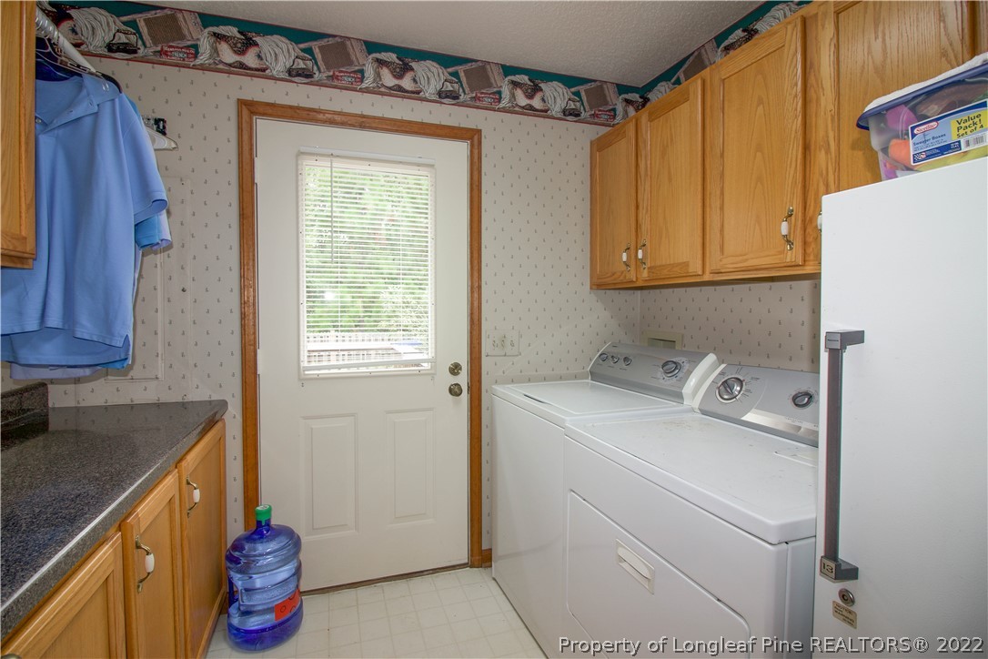 144 Manor Road Carthage, NC 28327 - Photo 39 of 47 a utility room with dryer and washer