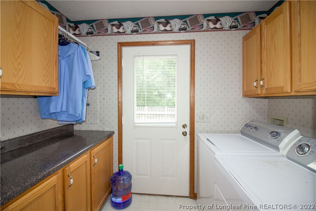 144 Manor Road Carthage, NC 28327 - Photo 40 of 47 a utility room with dryer and washer