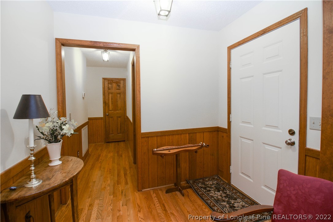 144 Manor Road Carthage, NC 28327 - Photo 6 of 47 a bathroom with a sink a toilet a mirror and shower