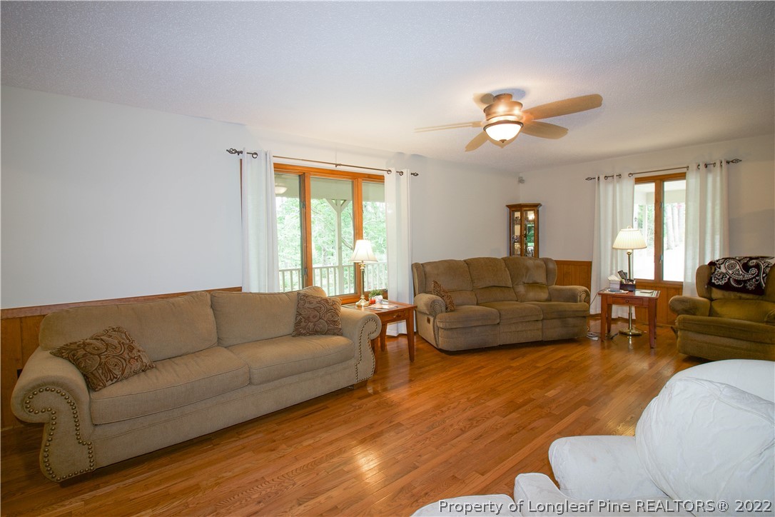 144 Manor Road Carthage, NC 28327 - Photo 8 of 47 a living room with furniture and a large window