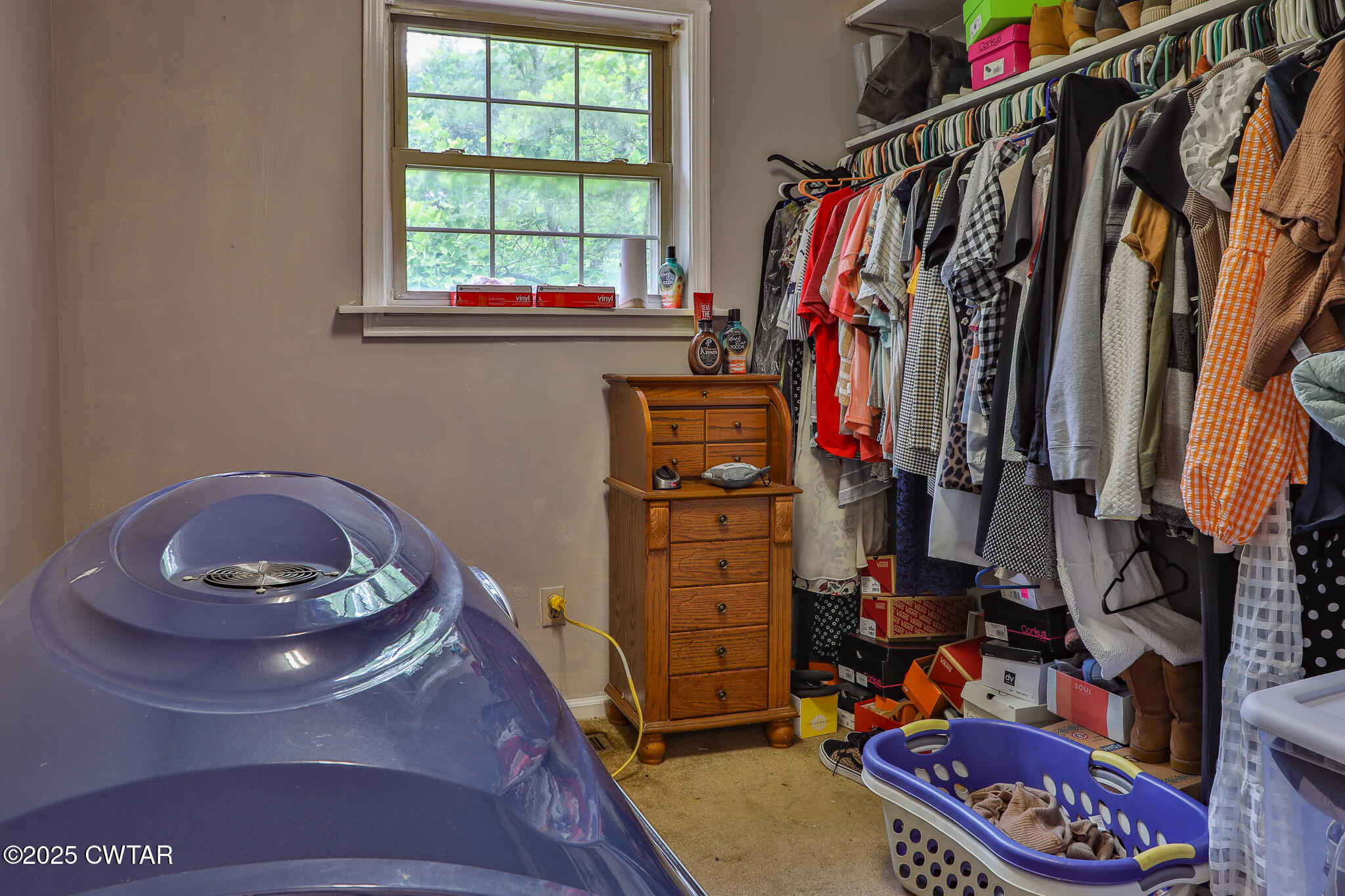 18 Tollie Markham Road Dyer, TN 38330 - Photo 13 of 27 a view of walk in closet with clothes