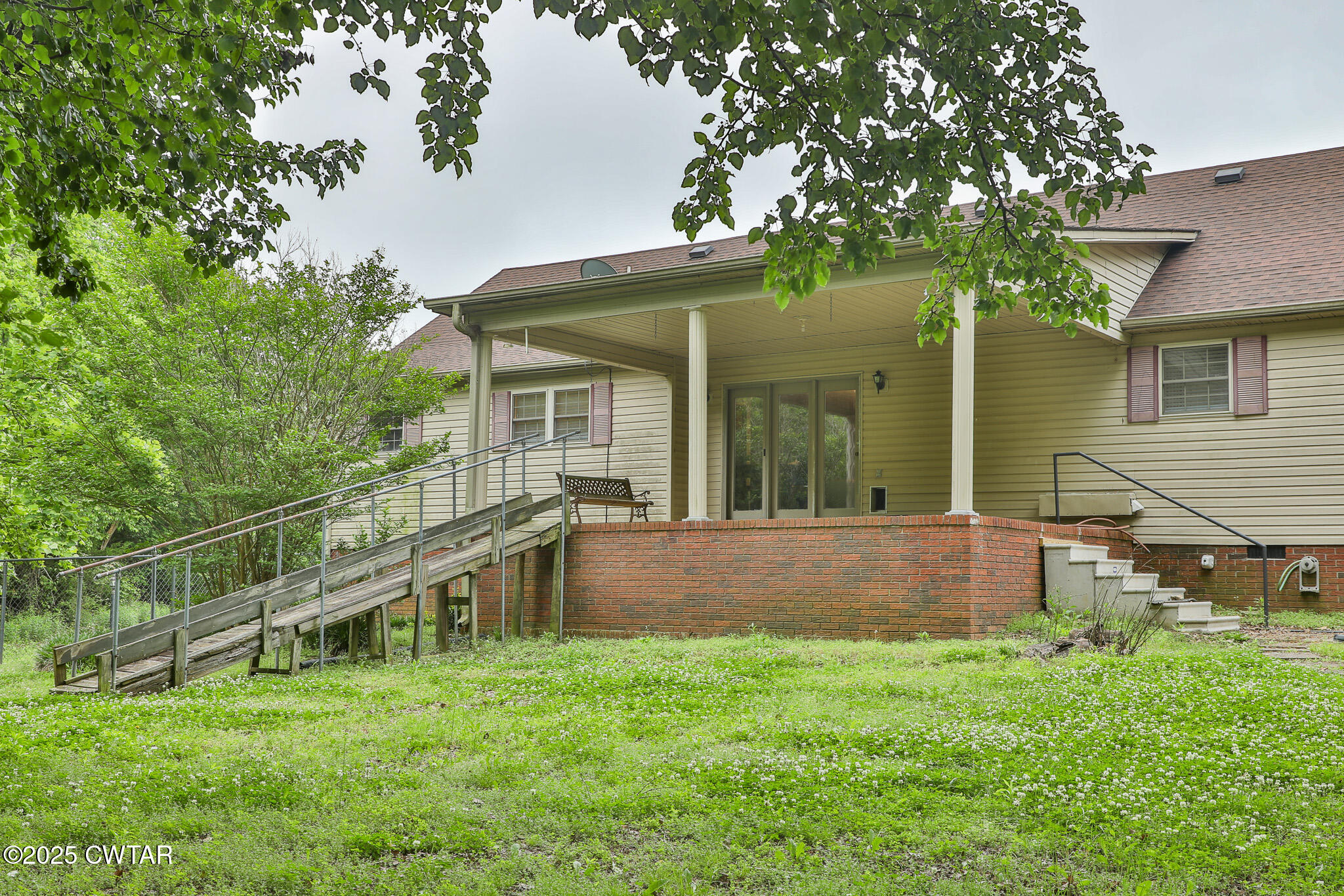 18 Tollie Markham Road Dyer, TN 38330 - Photo 16 of 27 front view of house with a yard