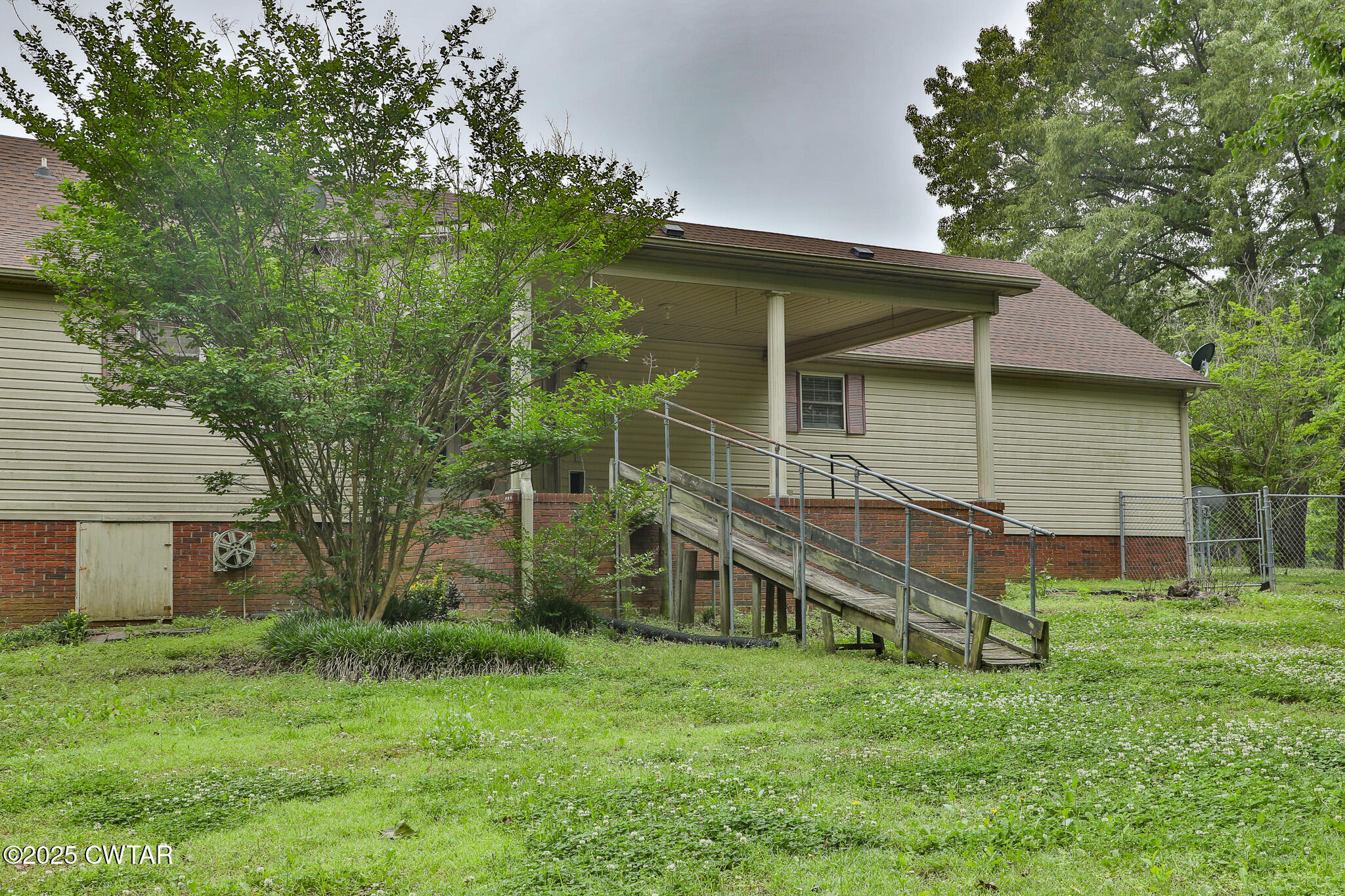18 Tollie Markham Road Dyer, TN 38330 - Photo 17 of 27 a view of house with backyard