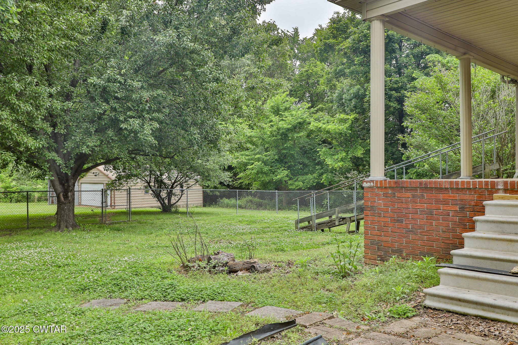 18 Tollie Markham Road Dyer, TN 38330 - Photo 18 of 27 a view of a backyard with a garden