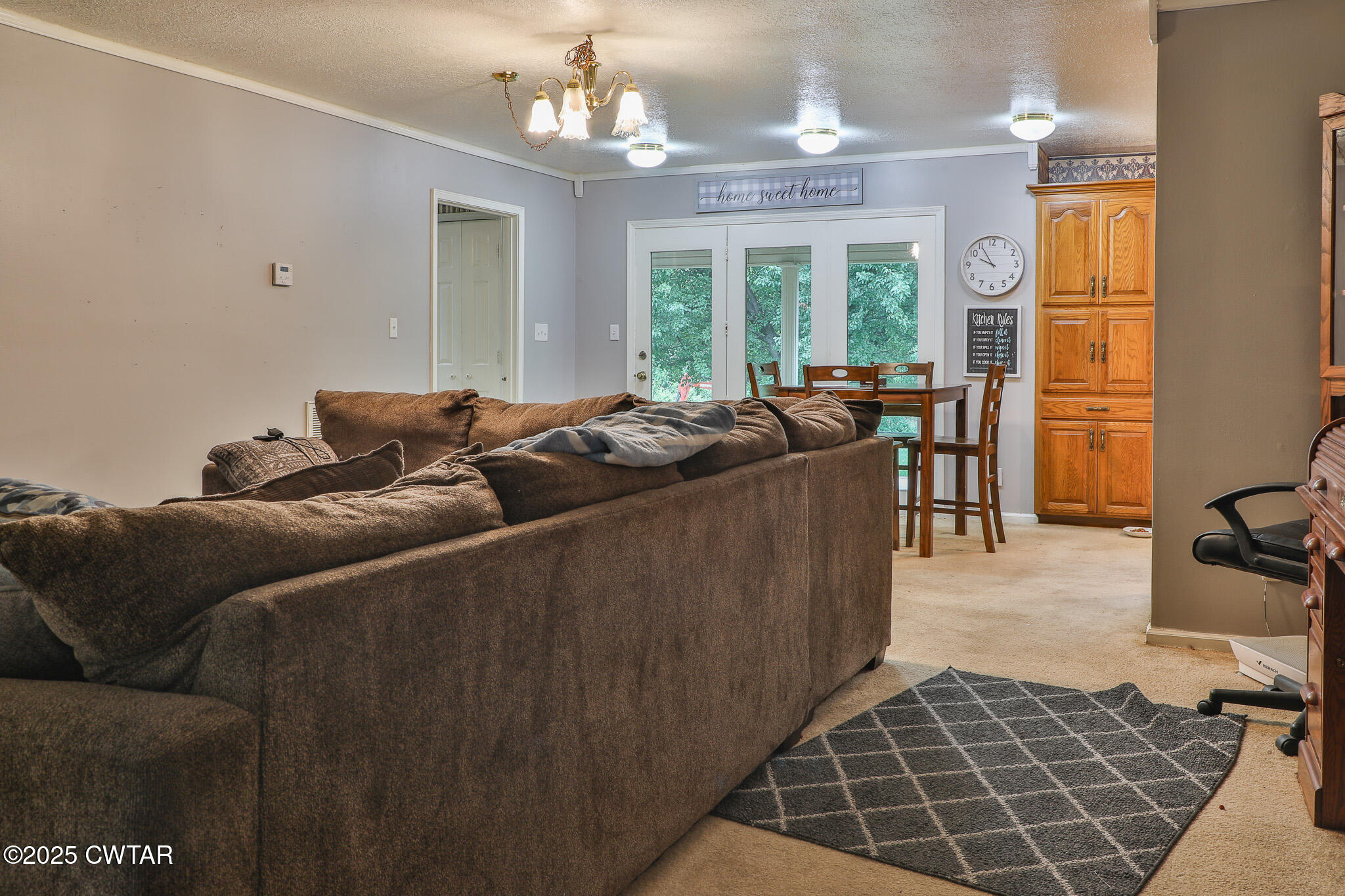 18 Tollie Markham Road Dyer, TN 38330 - Photo 2 of 27 a living room with furniture and a chandelier