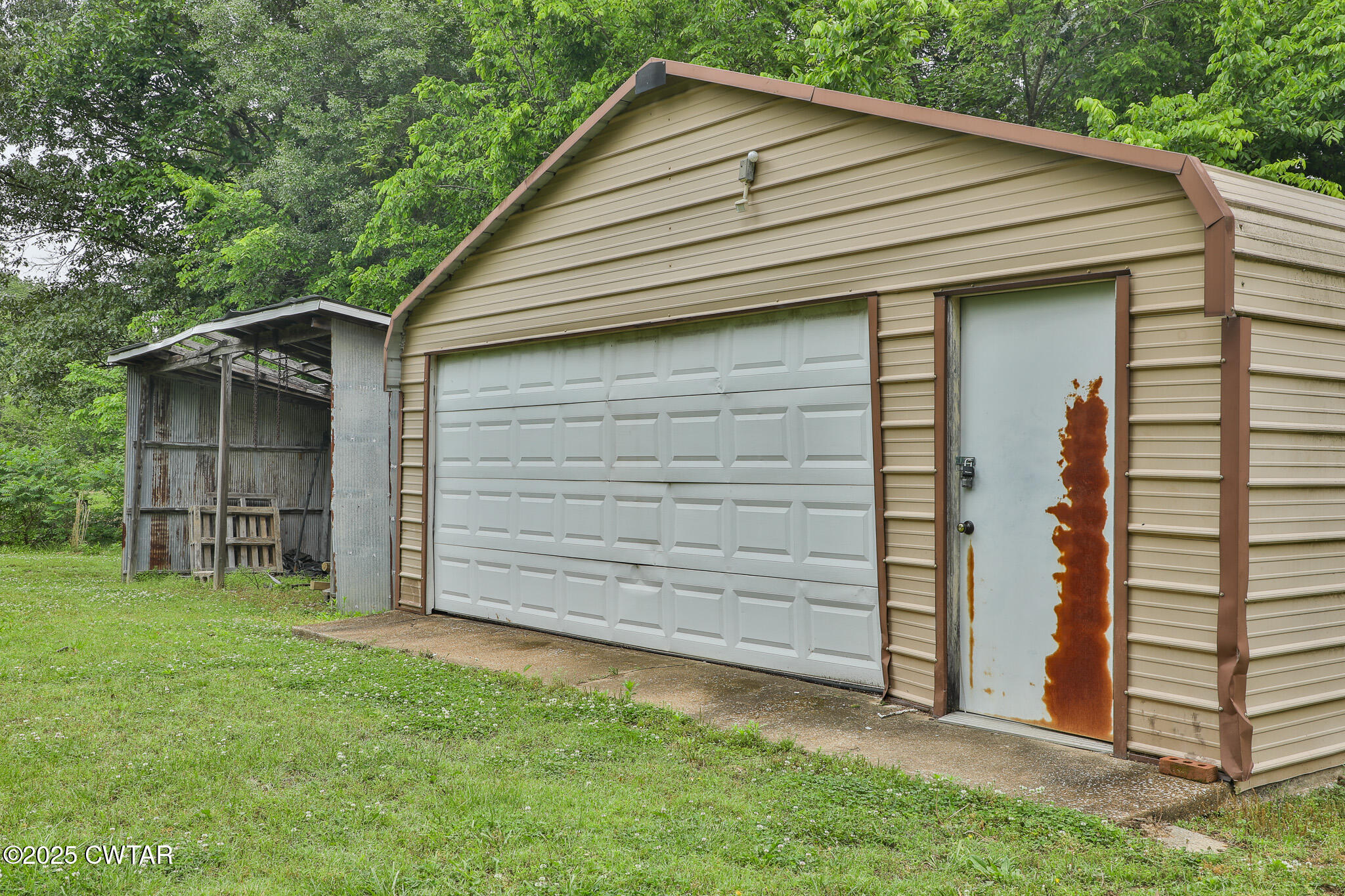 18 Tollie Markham Road Dyer, TN 38330 - Photo 21 of 27 a front view of house with a garden