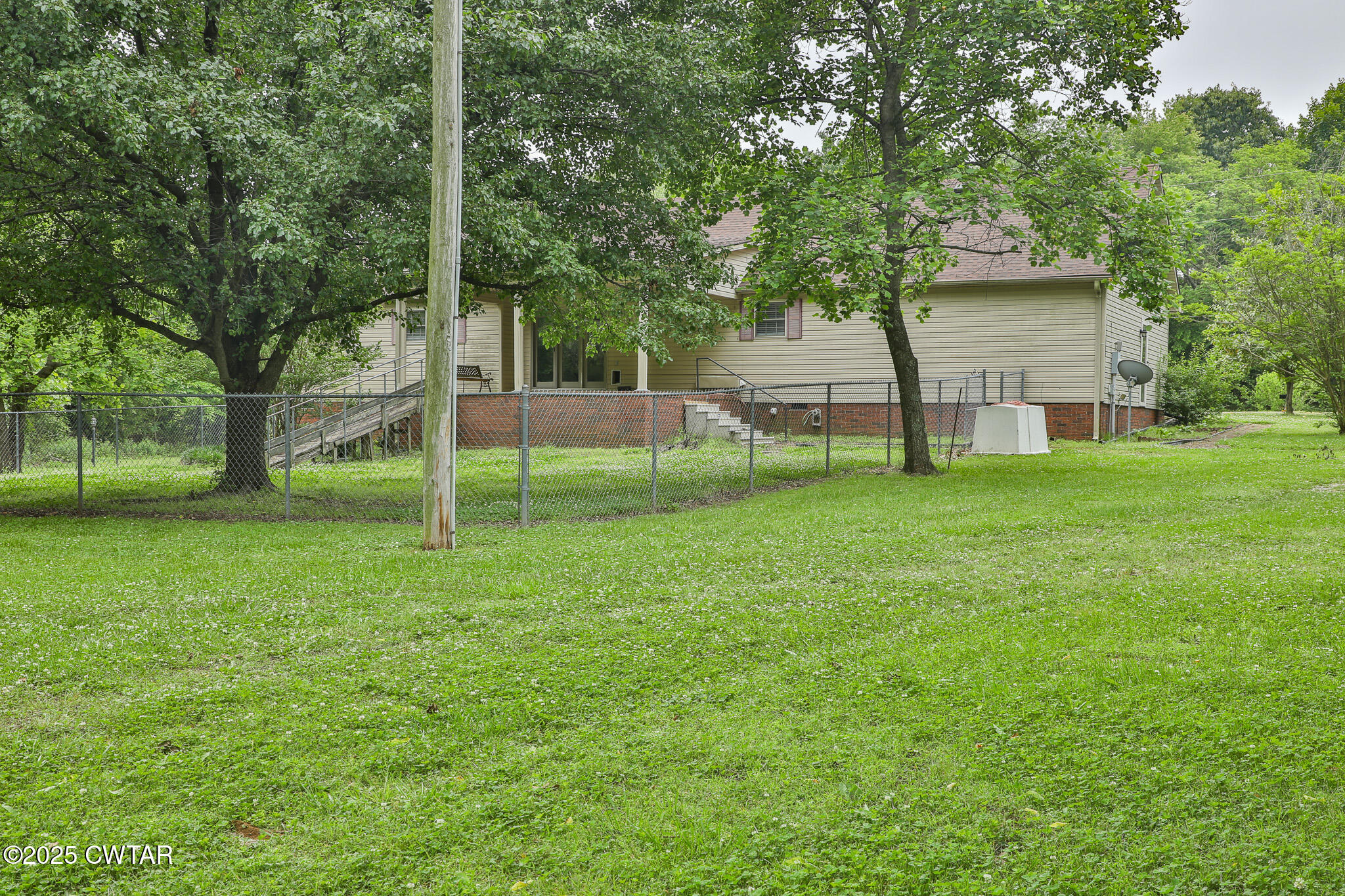 18 Tollie Markham Road Dyer, TN 38330 - Photo 27 of 27 a view of a backyard with large trees