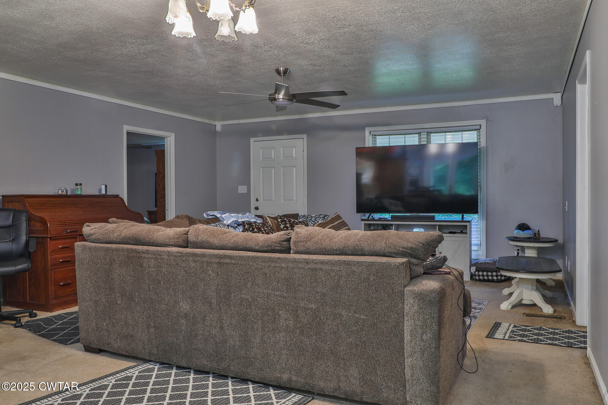 18 Tollie Markham Road Dyer, TN 38330 - Photo 3 of 27 a living room with furniture and a flat screen tv