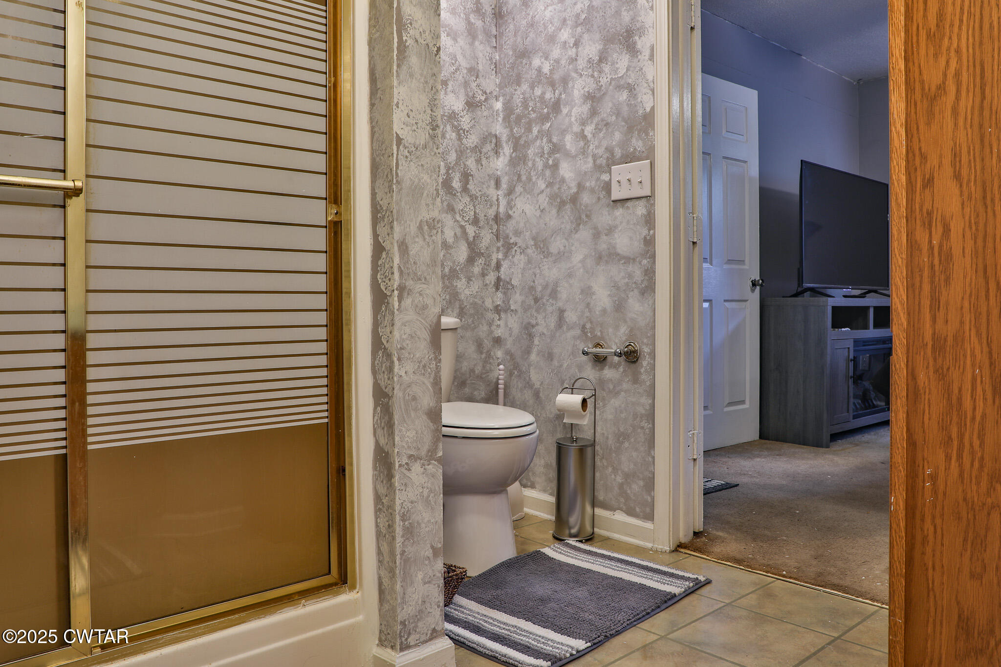 18 Tollie Markham Road Dyer, TN 38330 - Photo 10 of 27 a bathroom with a toilet and a shower