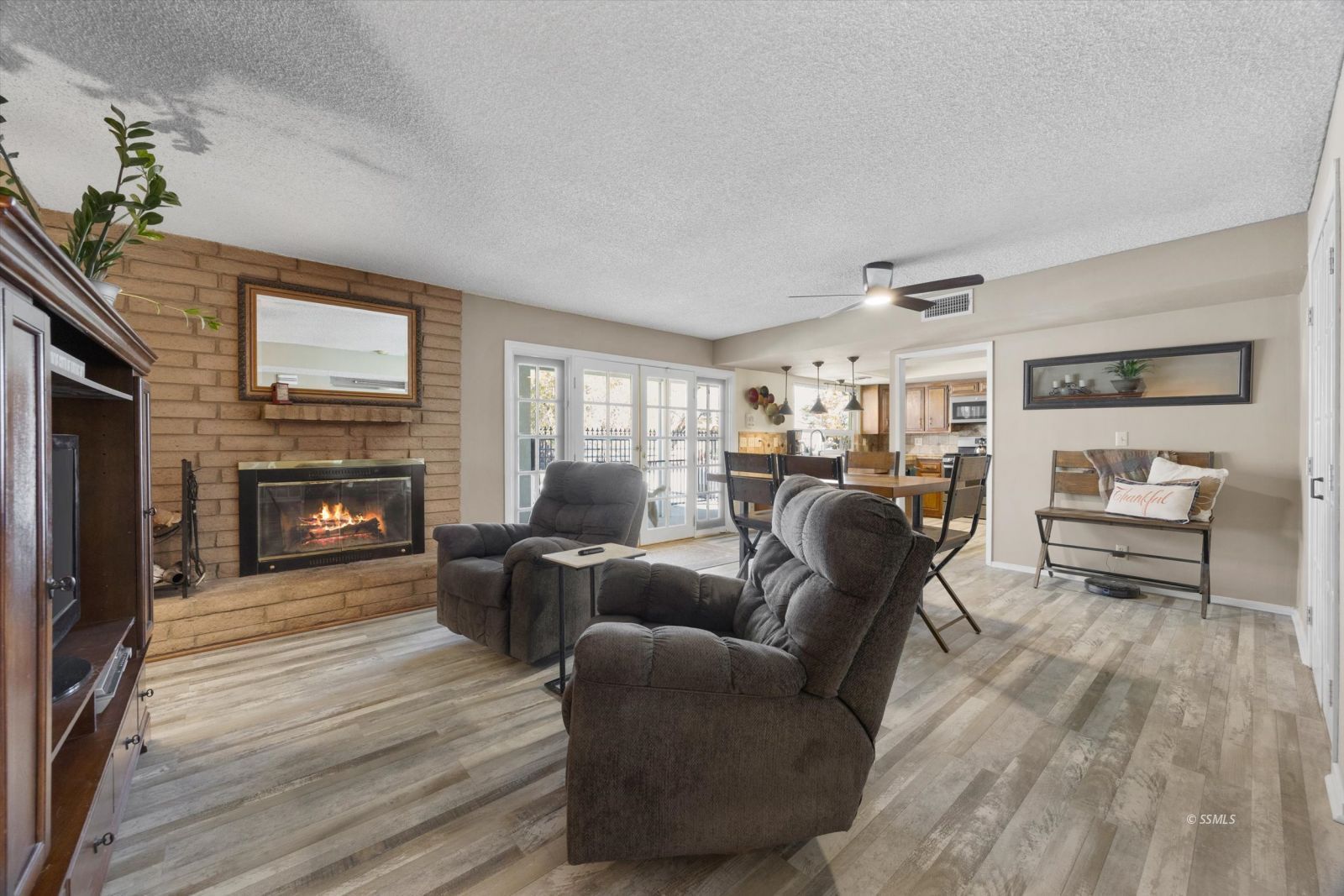736 Fendrick Circle Ridgecrest, CA 93555 - Photo 12 of 49 a living room with furniture and a fireplace