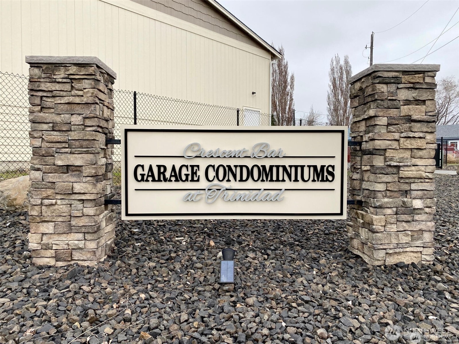 9967 Rd W 8 Northwest, Unit F 32 Quincy, WA 98848 - Photo 2 of 2 a sign on the side of a building