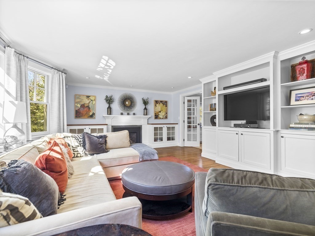35 Lehigh Road Wellesley, MA 02482 - Photo 11 of 23 a living room with furniture and a flat screen tv