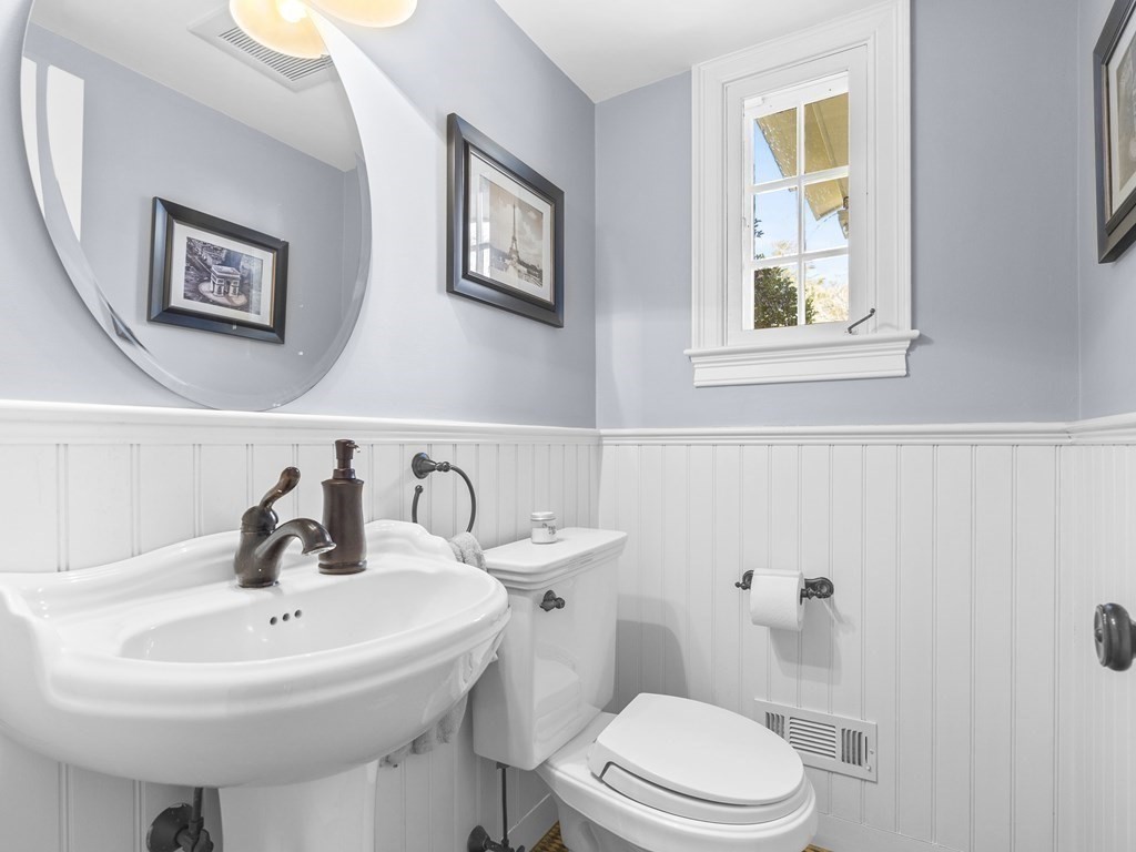 35 Lehigh Road Wellesley, MA 02482 - Photo 14 of 23 a bathroom with a sink a toilet and mirror