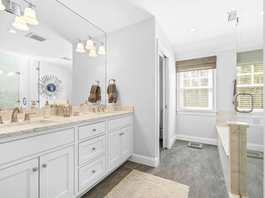 35 Lehigh Road Wellesley, MA 02482 - Photo 16 of 23 a bathroom with double sink and a mirror