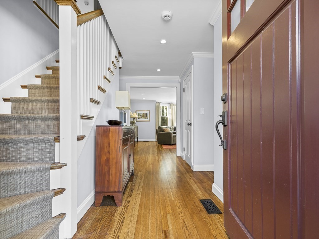 35 Lehigh Road Wellesley, MA 02482 - Photo 2 of 23 a view of a hallway with wooden floor and staircase