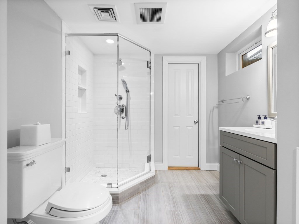 35 Lehigh Road Wellesley, MA 02482 - Photo 21 of 23 a bathroom with a sink a toilet and shower
