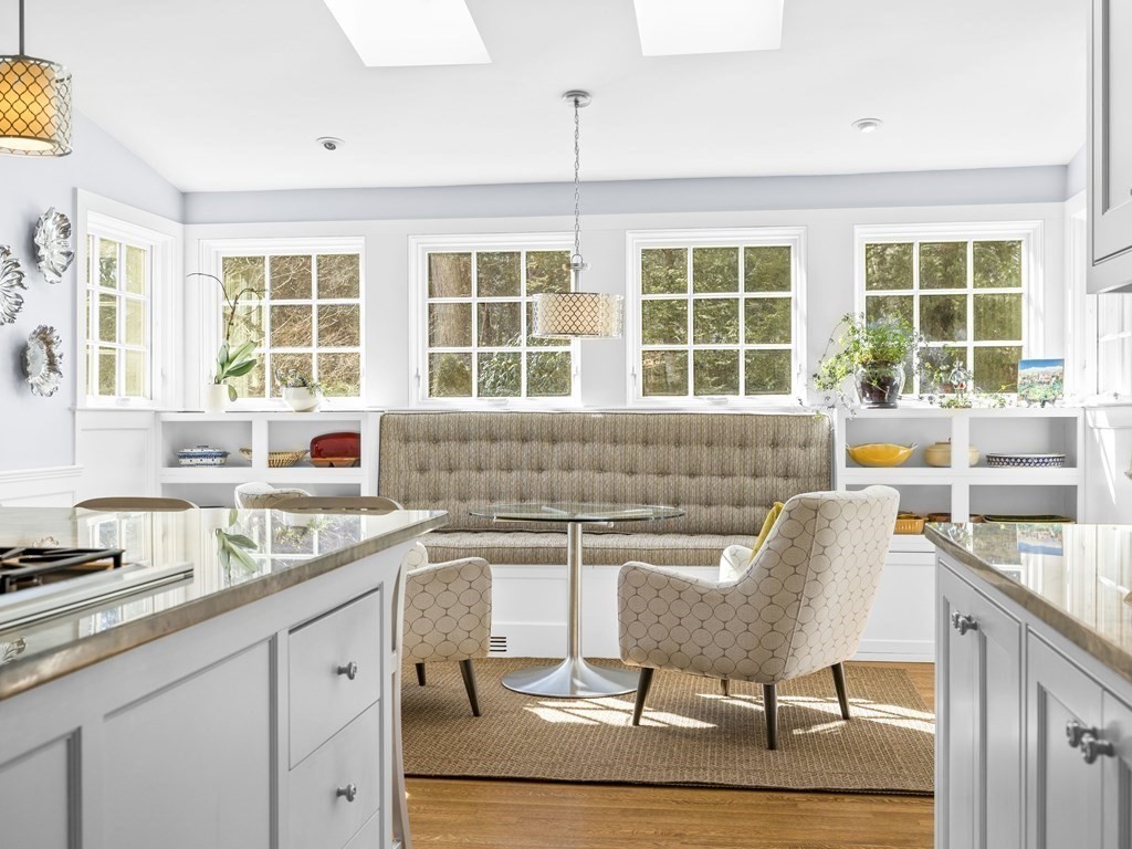 35 Lehigh Road Wellesley, MA 02482 - Photo 5 of 23 a view of a kitchen with a window and chairs