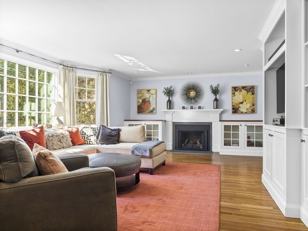 35 Lehigh Road Wellesley, MA 02482 - Photo 10 of 23 a living room with furniture and a fireplace