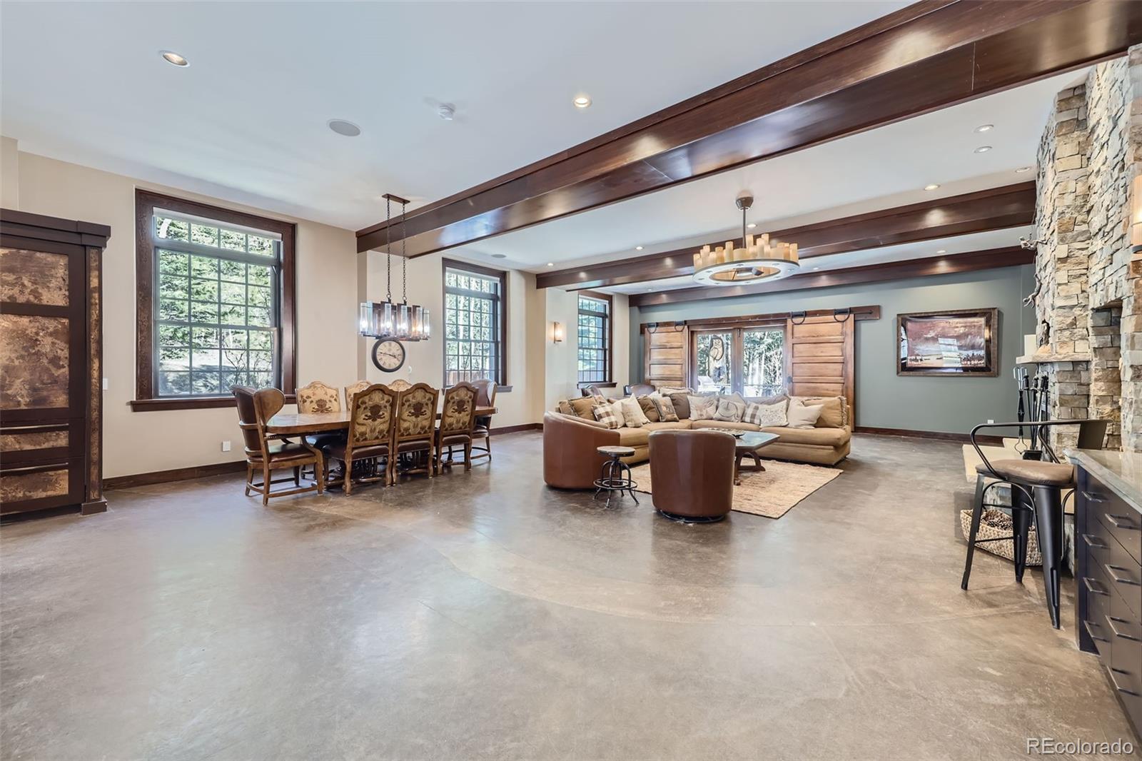 2971 Fall River Road Idaho Springs, CO 80452 - Photo 14 of 42 a living room with furniture and a large window