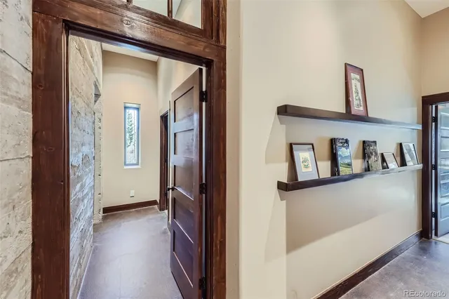 a view of a terrace with chairs and potted plants