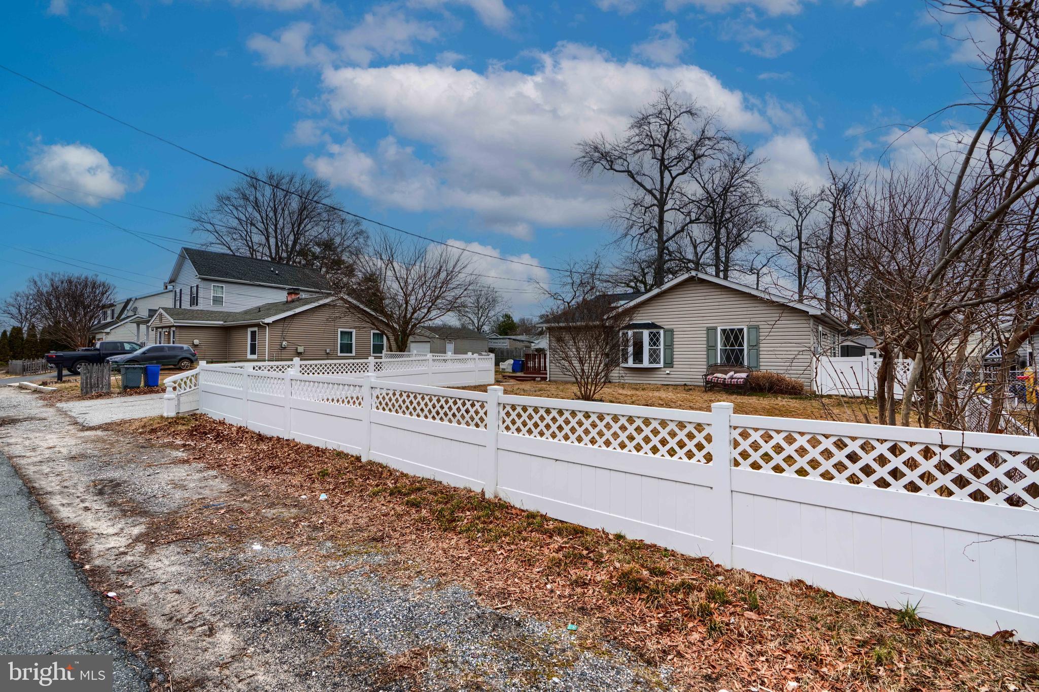 1309 3rd Road Baltimore, MD 21220 - Photo 2 of 38 a front view of a house with a yard
