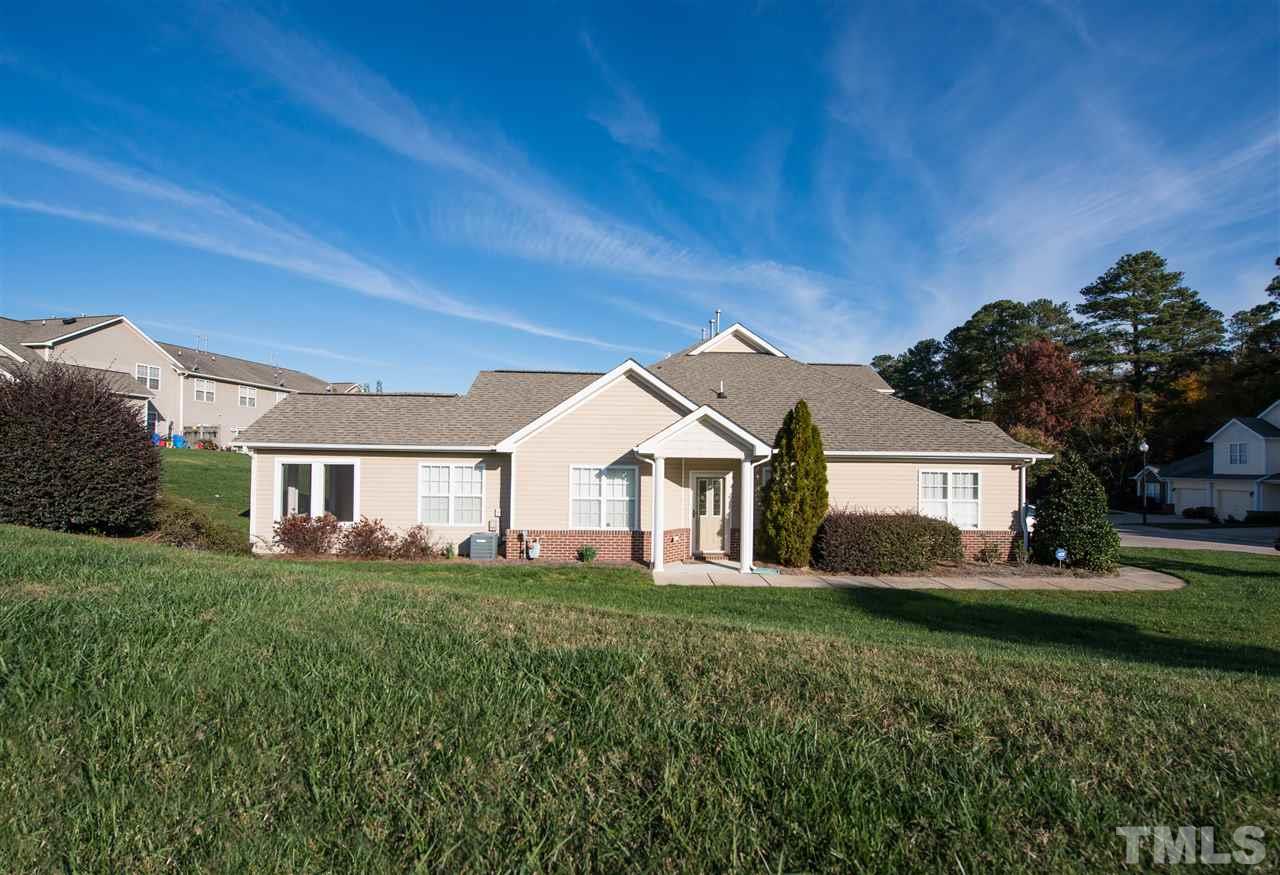 2605 Andover Glen Road Raleigh, NC 27604 - Photo 1 of 17 a front view of a house with a yard