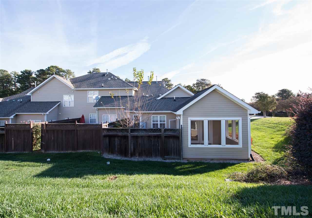 2605 Andover Glen Road Raleigh, NC 27604 - Photo 4 of 17 a view of a house with backyard and garden