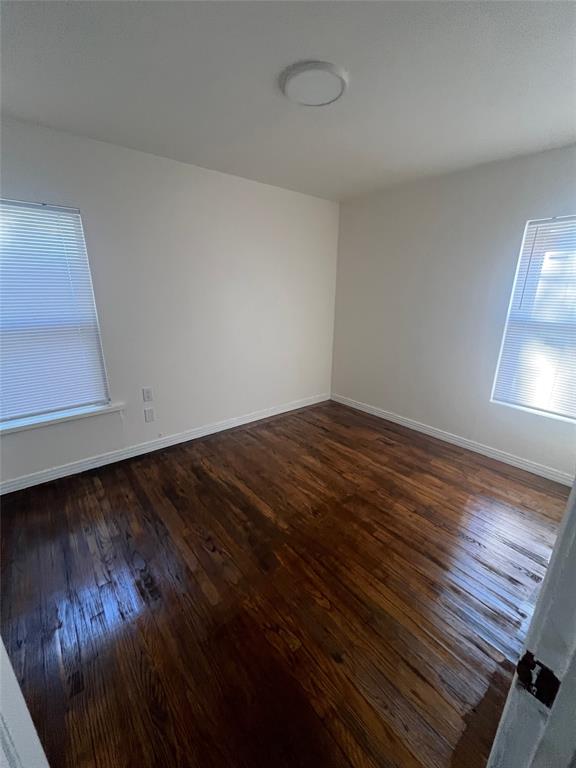 210 Clyde Street Abilene, TX 79605 - Photo 11 of 15 a view of a room with wooden floor and window