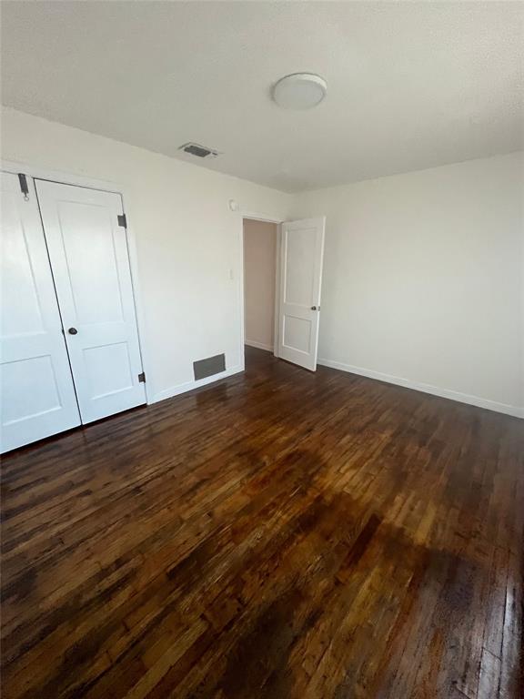210 Clyde Street Abilene, TX 79605 - Photo 14 of 15 a view of empty room with wooden floor
