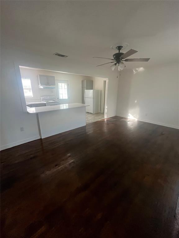 210 Clyde Street Abilene, TX 79605 - Photo 2 of 15 a view of room window and wooden floor