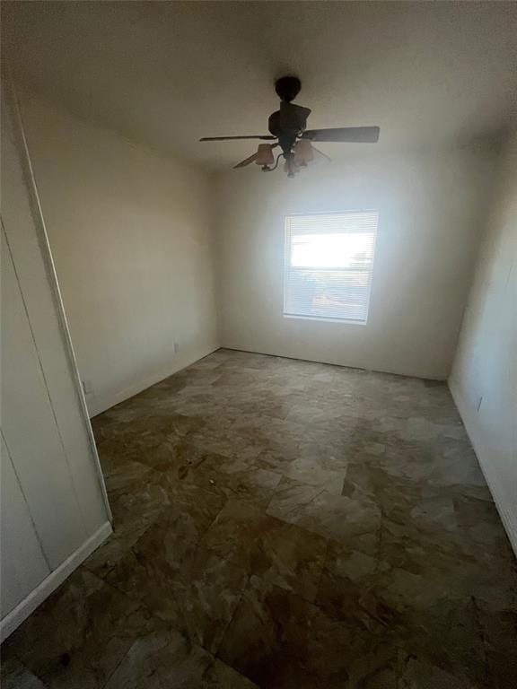 210 Clyde Street Abilene, TX 79605 - Photo 8 of 15 an empty room with a window