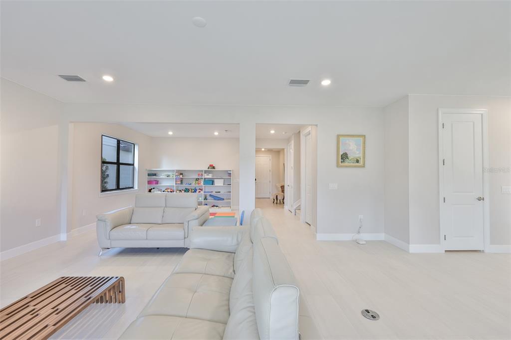 16320 Hidden Oak Loop Bradenton, FL 34211 - Photo 11 of 56 a living room with furniture and white walls