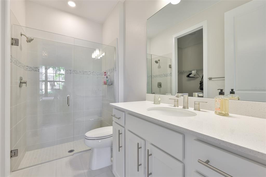 16320 Hidden Oak Loop Bradenton, FL 34211 - Photo 26 of 56 a bathroom with a sink a toilet and shower