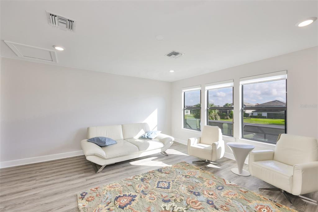 16320 Hidden Oak Loop Bradenton, FL 34211 - Photo 37 of 56 a living room with furniture and a window