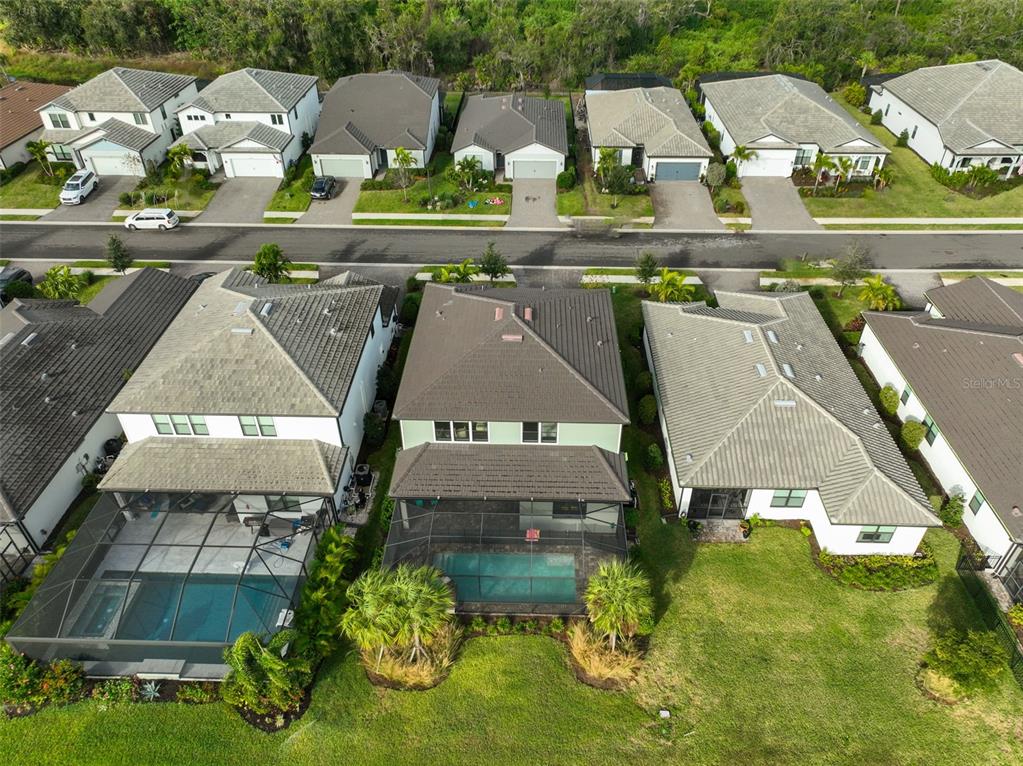 16320 Hidden Oak Loop Bradenton, FL 34211 - Photo 49 of 56 an aerial view of houses with yard