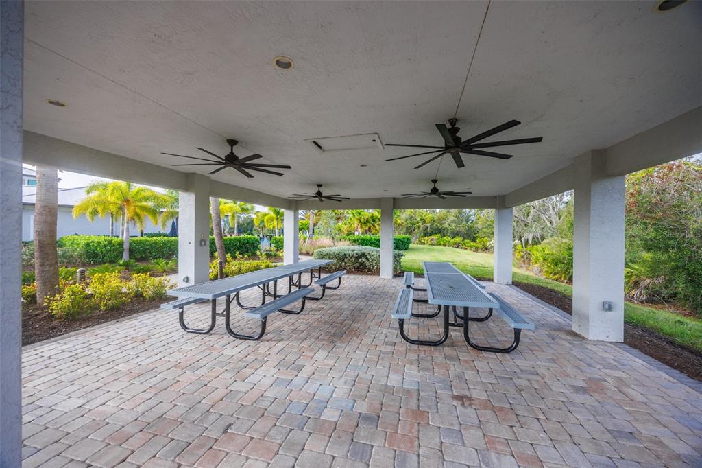 16320 Hidden Oak Loop Bradenton, FL 34211 - Photo 52 of 56 a view of a patio with wooden floor