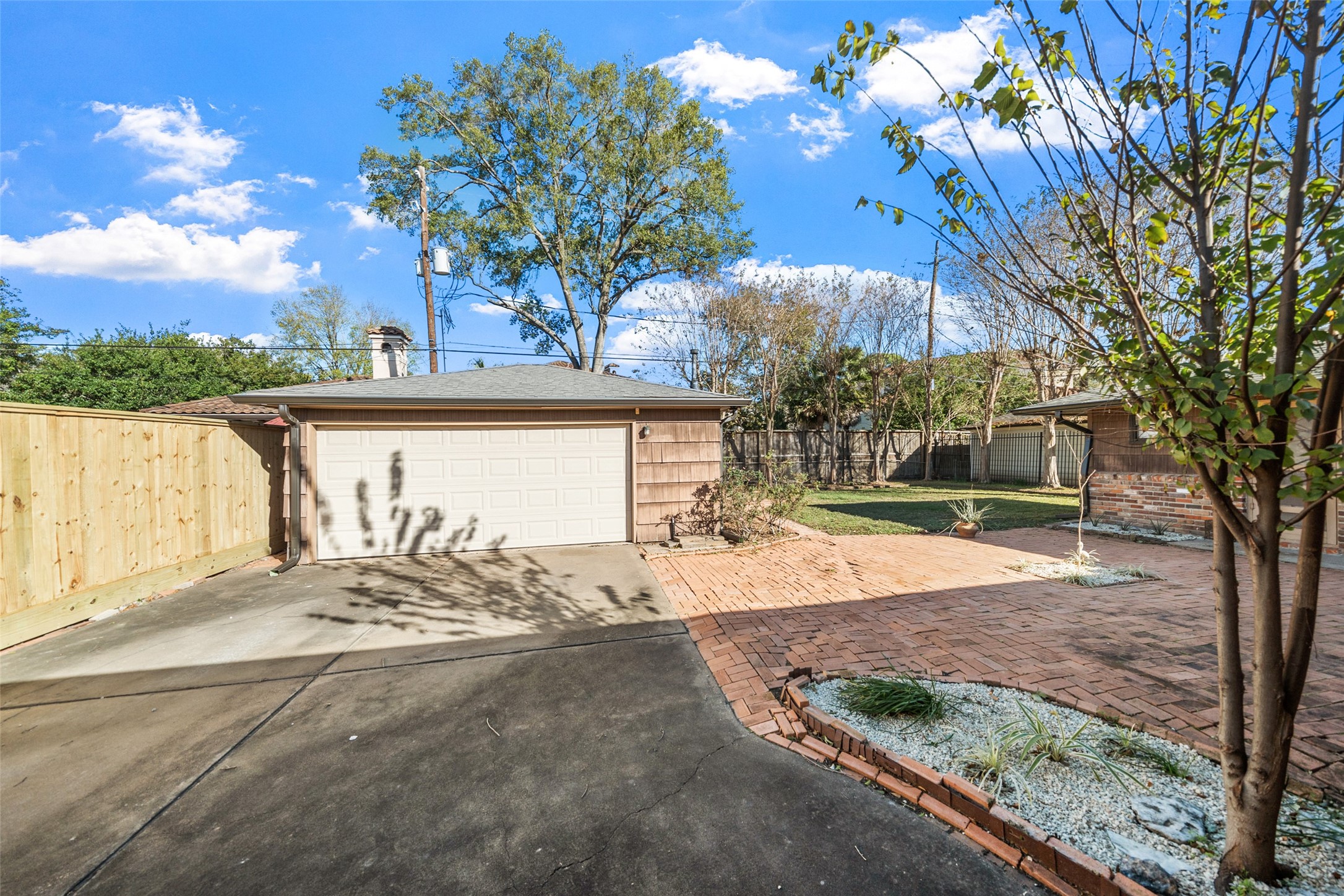 4614 Merwin Street Houston, TX 77027 - Photo 30 of 49 Driveway and Garage