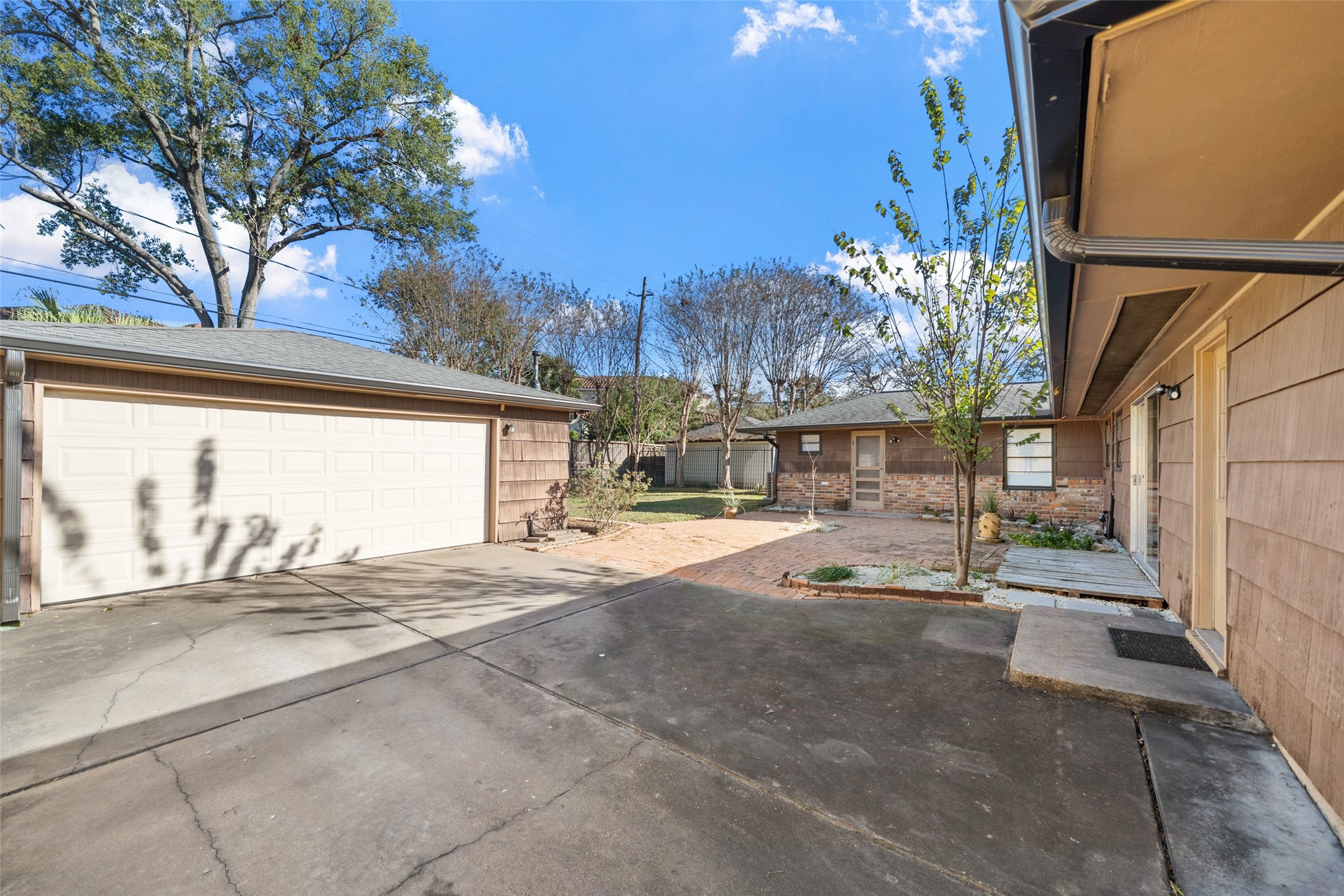 4614 Merwin Street Houston, TX 77027 - Photo 31 of 49 Garage and Backyard
