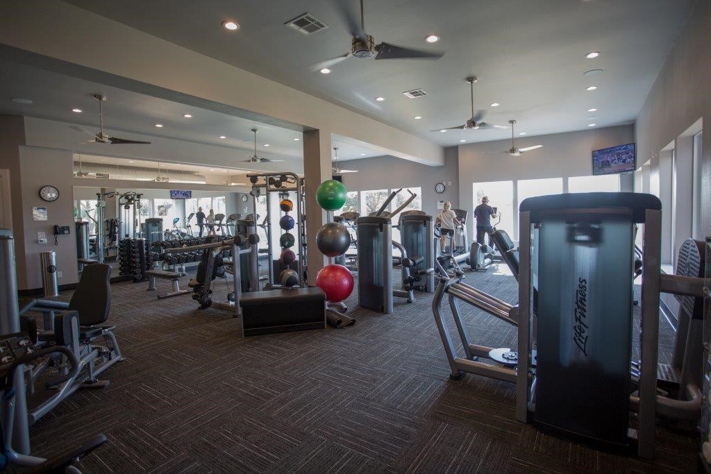 33201 Worthing Lane Fulshear, TX 77441 - Photo 5 of 8 a view of a room with gym equipment