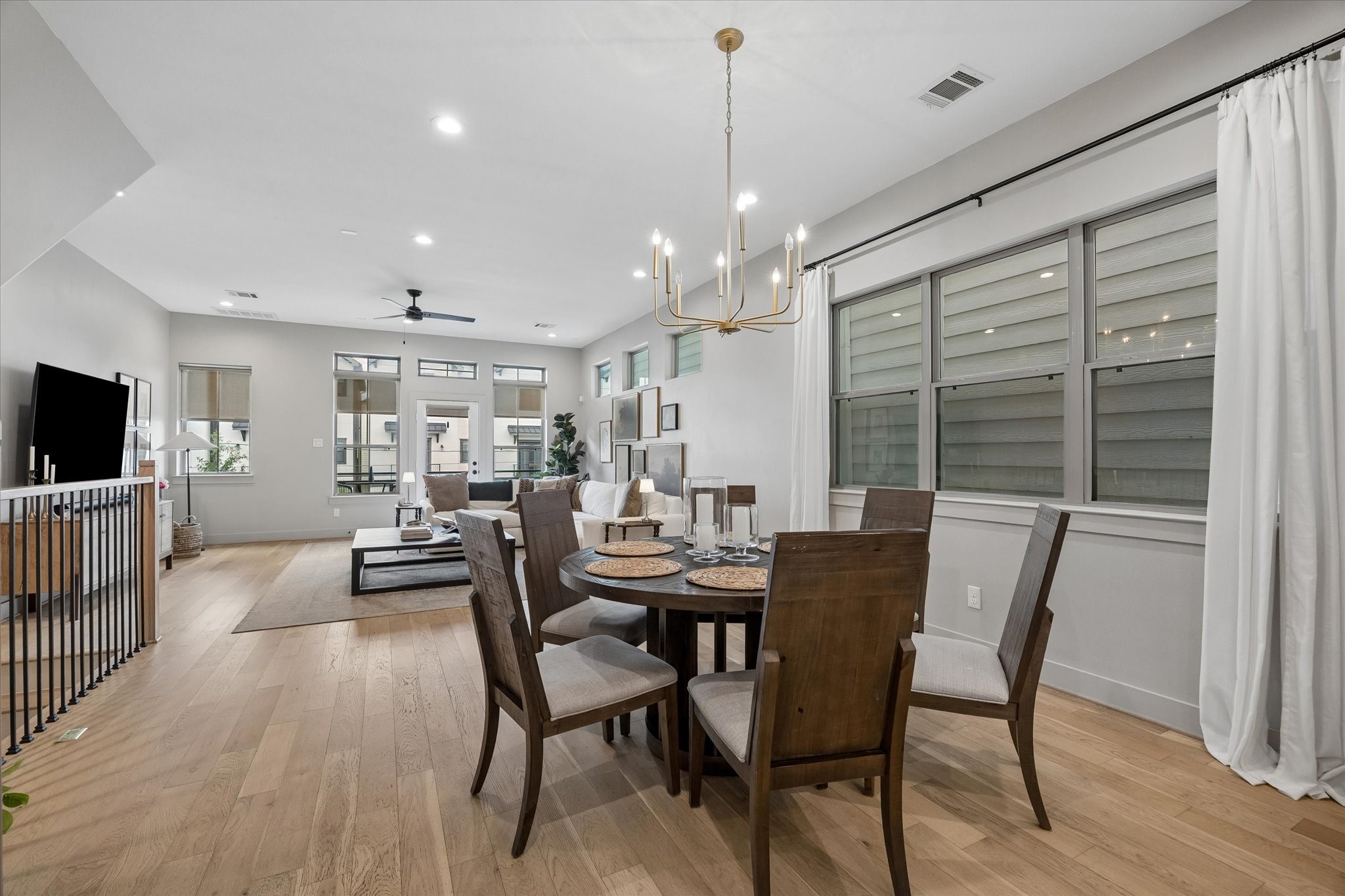 2407 Bevis Street Houston, TX 77008 - Photo 12 of 34 a view of a dining room with furniture window and wooden floor