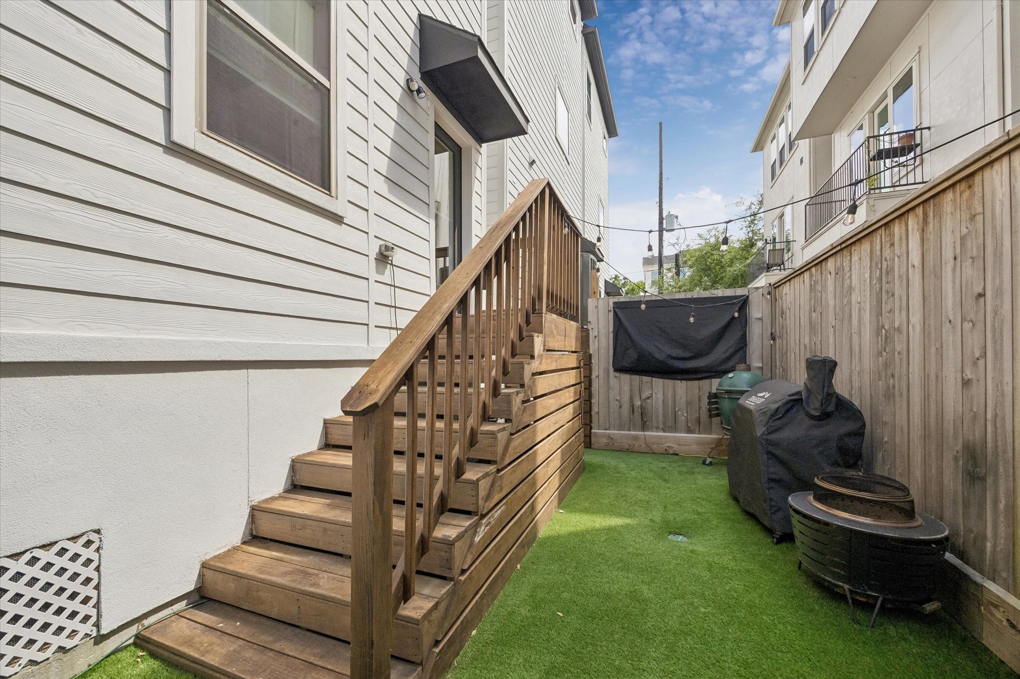 2407 Bevis Street Houston, TX 77008 - Photo 28 of 34 a view of entryway with wooden stairs