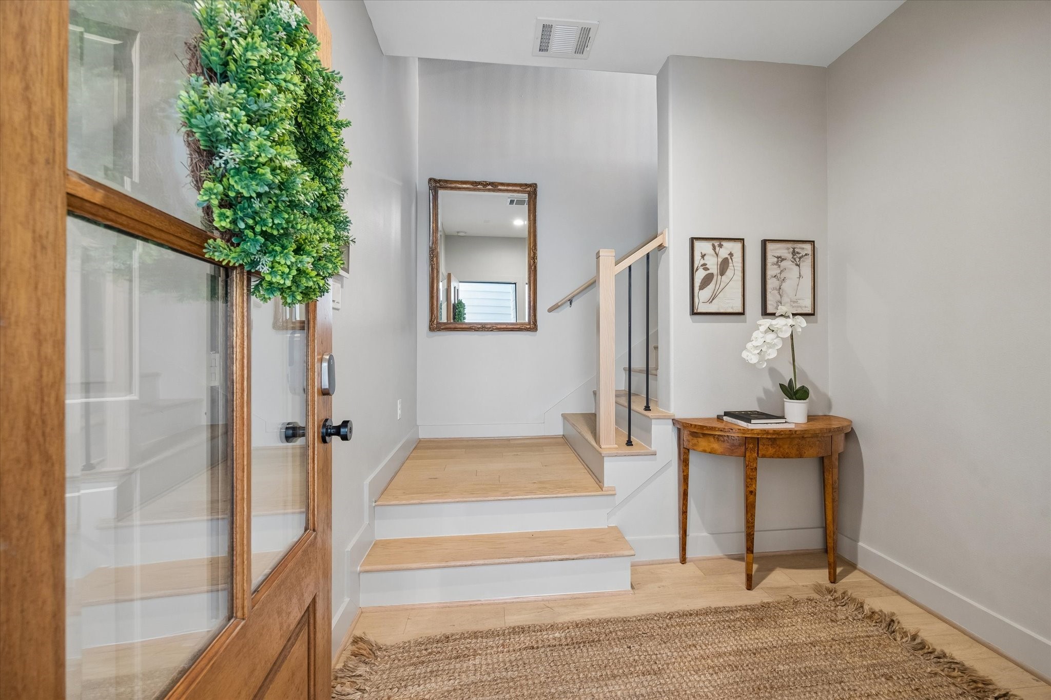 2407 Bevis Street Houston, TX 77008 - Photo 3 of 34 a view of an entryway with wooden floor
