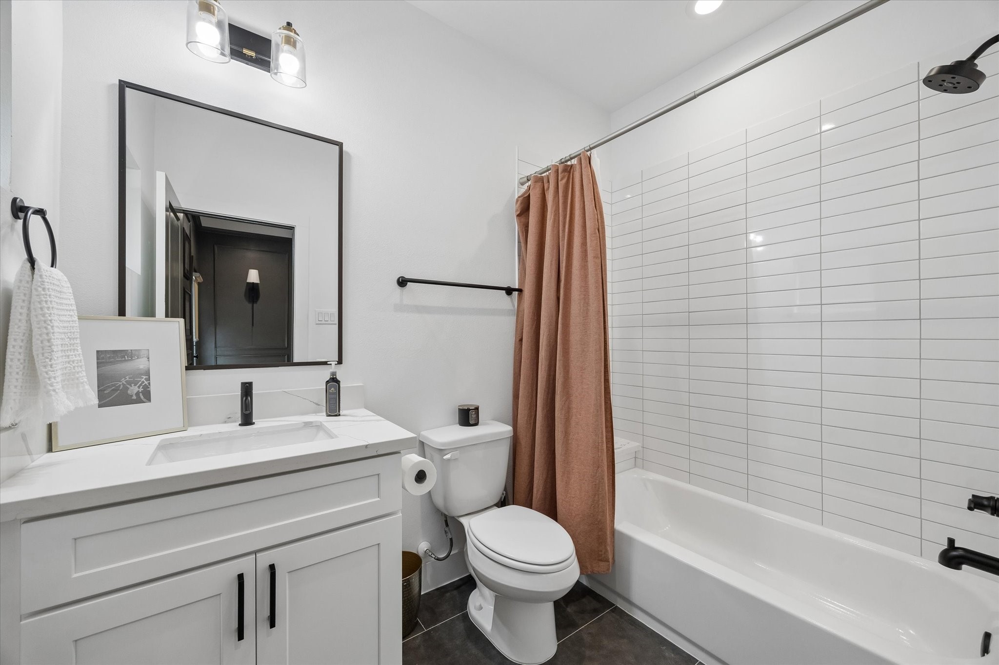 2407 Bevis Street Houston, TX 77008 - Photo 6 of 34 a bathroom with a sink toilet and shower