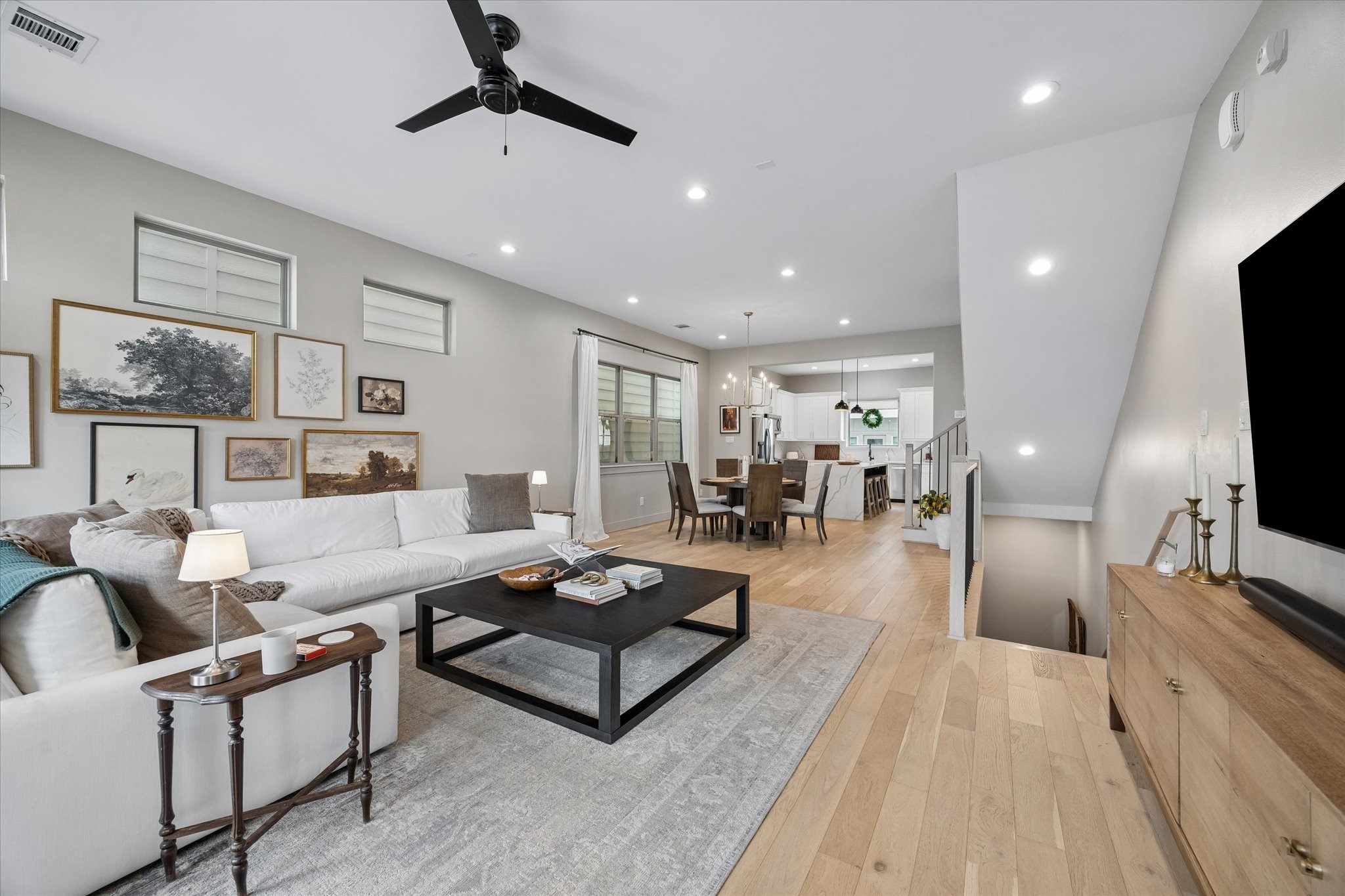 2407 Bevis Street Houston, TX 77008 - Photo 7 of 34 a living room with furniture and a flat screen tv