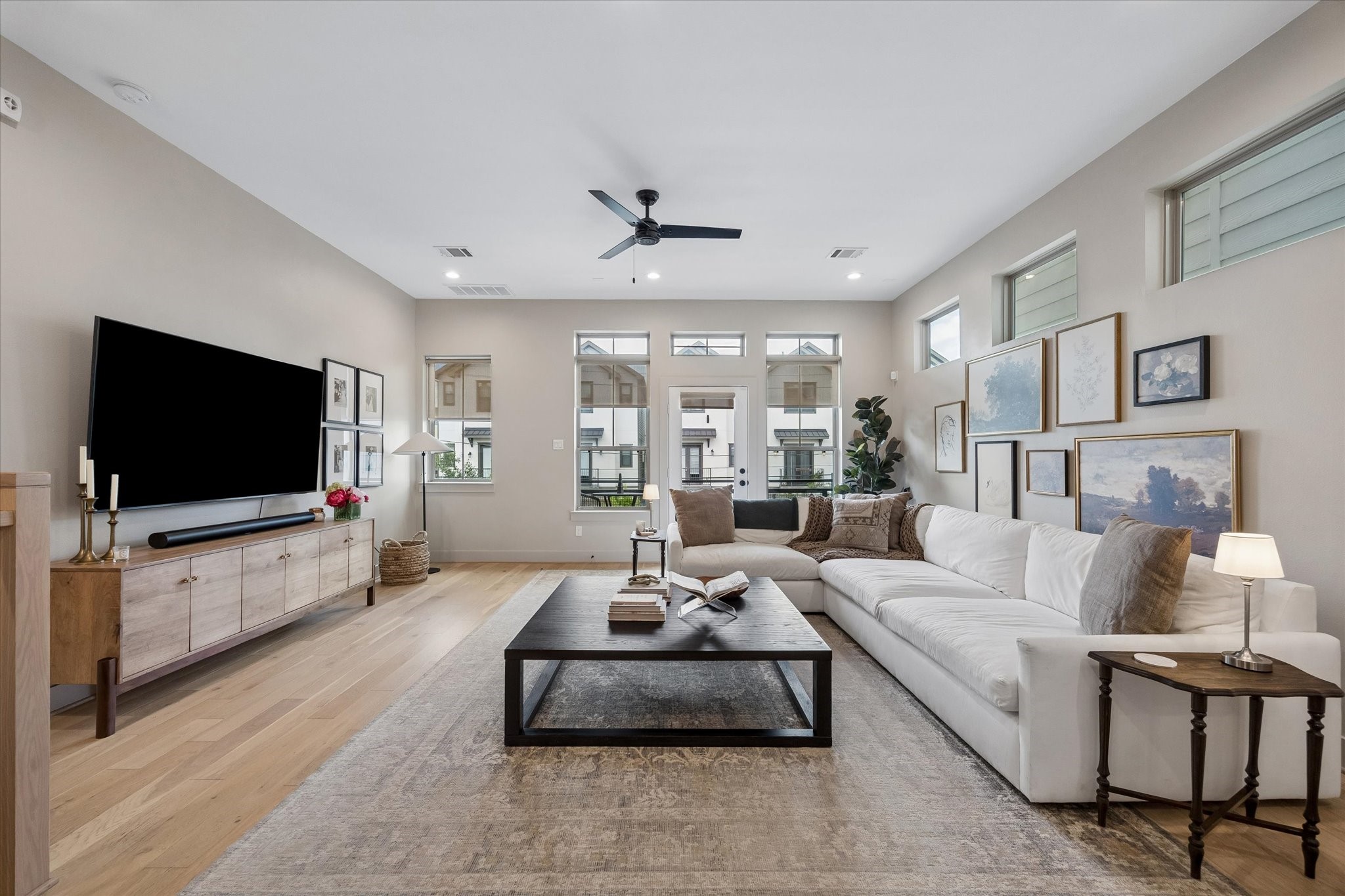 2407 Bevis Street Houston, TX 77008 - Photo 8 of 34 a living room with furniture and a flat screen tv